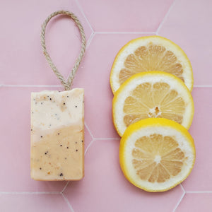 
                
                    Load image into Gallery viewer, Lemon and Poppy Seed Soap is made of a blend of cocoa butter and several plant oils, including olive oil, almond oil, castor oil and coconut oil for an intense boost of moisture.
                
            